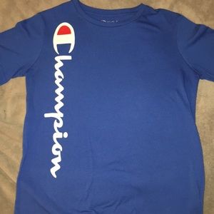 A blue champion shirt